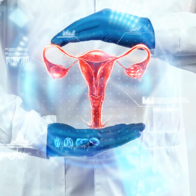 The doctor looks at the hologram of the female uterus, checks the test result. Ovarian disease, ectopic pregnancy, painful periods, surgery, innovative technologies, medicine of the future