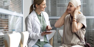 middle-aged-woman-with-skin-cancer-talking-with-her-doctor