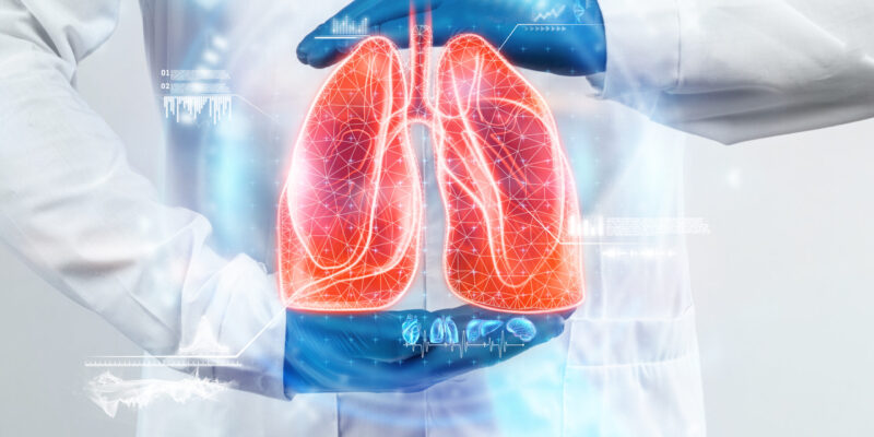 The doctor looks at the hologram of Lungs, checks the test result on the virtual interface and analyzes the data. Pneumonia, donation, innovative technologies, medicine of the future